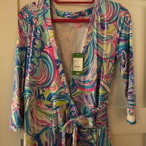 Never been worn Lilly P wrap dress.